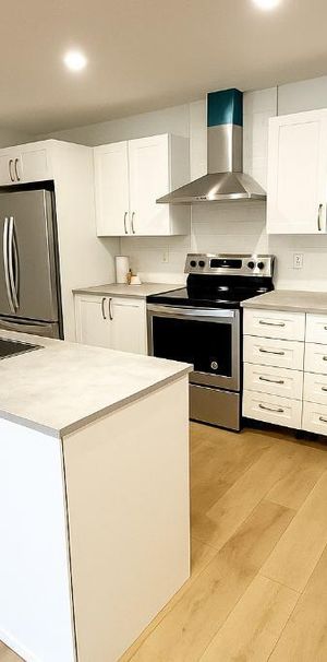 4 1/2 Condo rénové à louer près du boulevard St-Jean, dans l'ouest de l'île - Photo 1