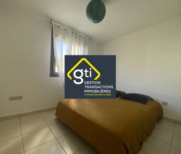 Location Appartement 3 pièces 61m² ST DENIS 97400 - Photo 2