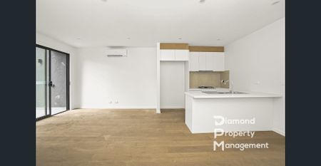 Luxurious Townhouse Living with Cutting-Edge Features - Photo 2