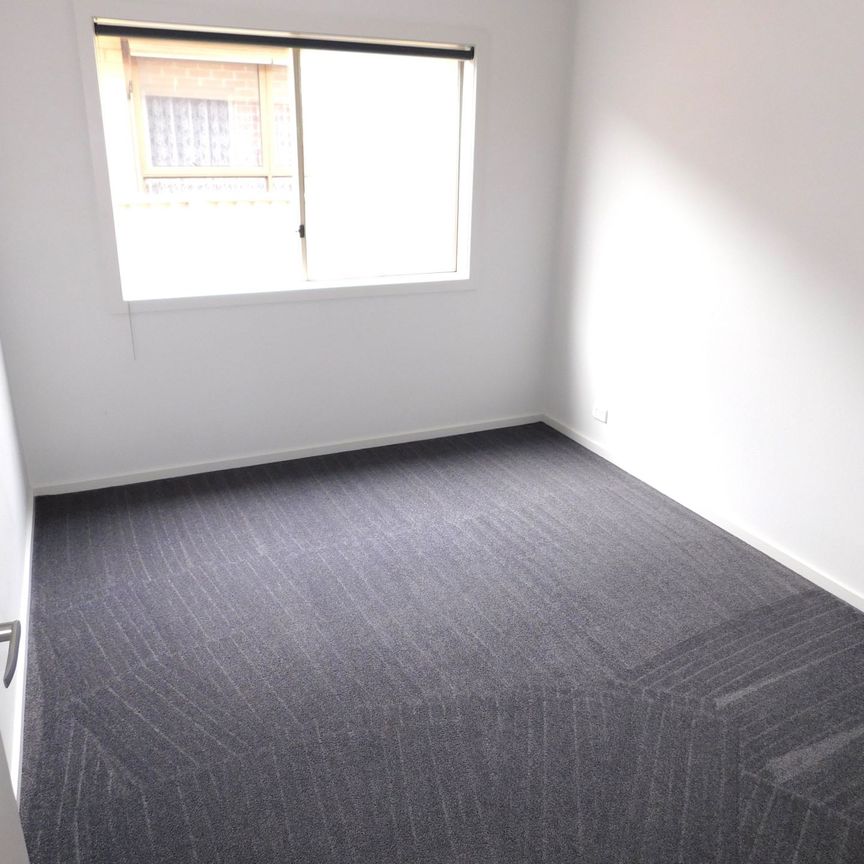 SPACIOUS THREE BEDROOM HOME CLOSE TO ALL AMENITIES - Photo 1