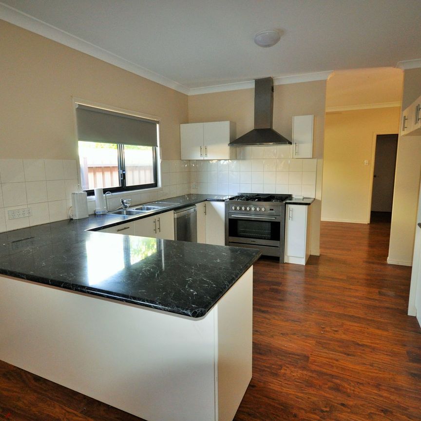 Spacious 4-Bedroom Family Home with Pool - Photo 1