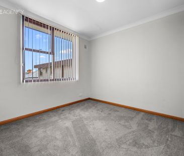 Top Floor, Prime Location, Easy Living! - Photo 1