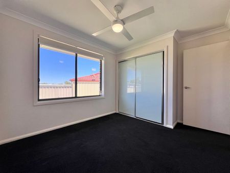 NEAR NEW 4 BEDROOM HOME - Photo 3