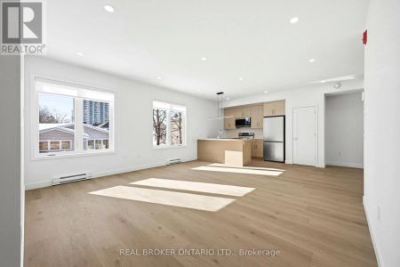 4 - 184 WOODROFFE AVENUE - Photo 3