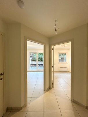 Verzorgd appartement met twee slaapkamers en ruim terras in de Broekstraat in Heverlee. - Foto 1