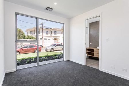 Modern Three bedroom Two Bathroom home in Wanted Locale - Photo 2