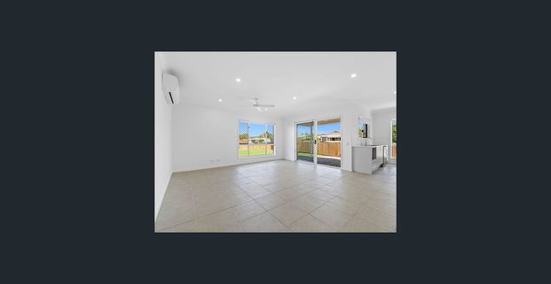 NEAR NEW SPACIOUS, STYLISH AND MODERN 4 BEDROOM HOME IS CALLING YOUR NAME! - Photo 1