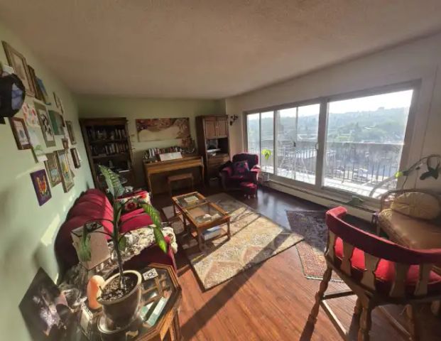 Furnished 2 Bed, 1 Bath Condo | 802 - 1335 12 Ave SW, Calgary - Photo 1