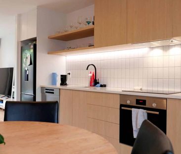 Stylish and Sun-Filled Two-Bedroom Townhouse - Photo 1