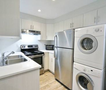 MODERN and very spacious 2 bedroom suite - utilities included! - Photo 3