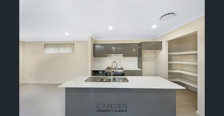 Charming and Spacious Home for Rent in the Heart of Austral's Thriving Community! - Photo 3