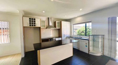 Brick & Tile Comfort in a Handy Location - Photo 3