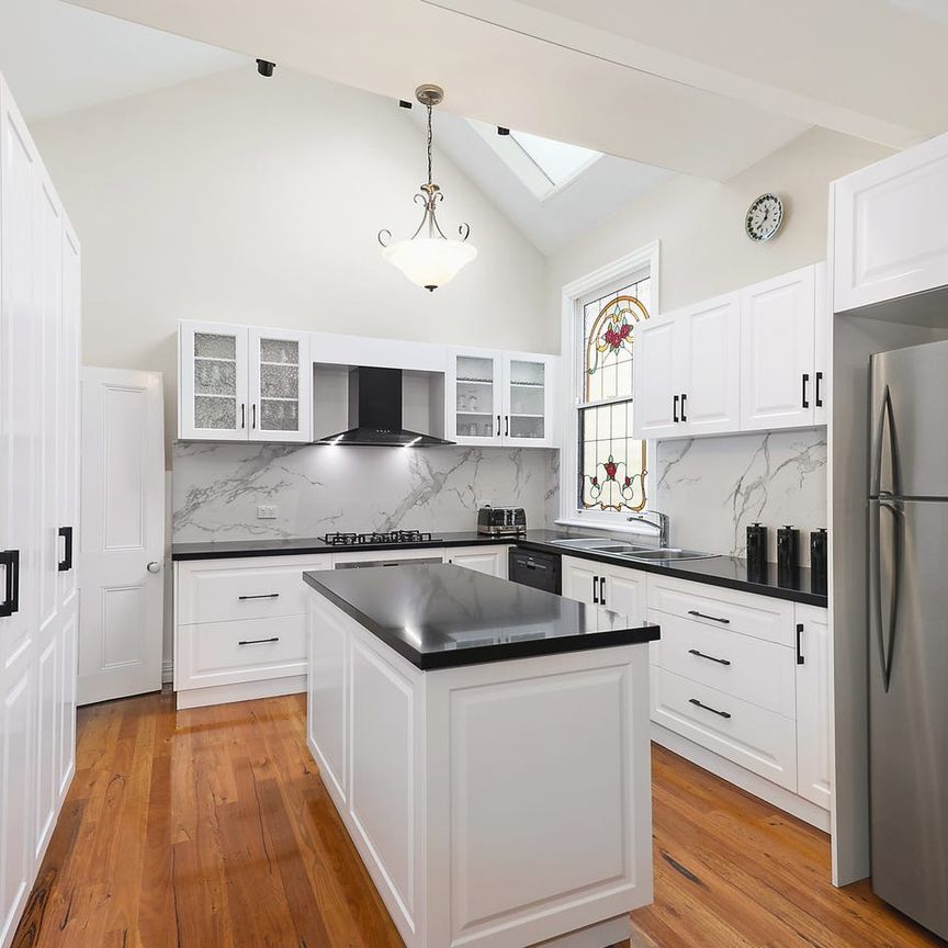 Picture Perfect in a Beautiful Tree Lined Street - Photo 1