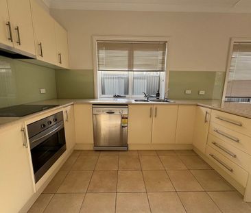 Neat & Well-Located Home with Outdoor Entertaining - Photo 3