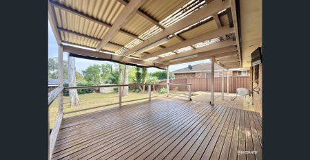 Three-Bedroom Home with Covered Deck in Mount Annan - Photo 4