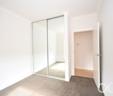 Open the Door To Stylish Easy-Care Living in Hillcrest - Photo 4