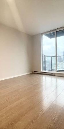 Spacious + High Floor Views 1 Bed + Den @ Brava - UNFURNISHED - Photo 1