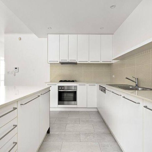 IMMACULATE OVERSIZED GARDEN APARTMENT IN TRANQUIL SETTING - Photo 1