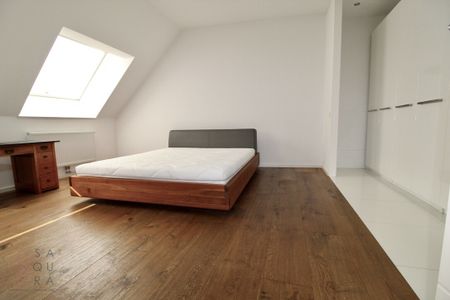 Gemütliche Dachgeschosswohnung mit atemberaubender Dachterrasse! - Foto 4