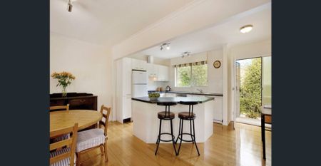 A quiet tree-lined street situated in an excellent location - Photo 3