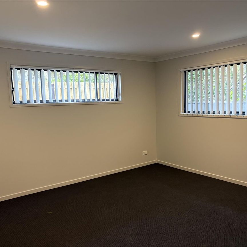 Modern Family Home In Quite Burpengary East Estate - Photo 1