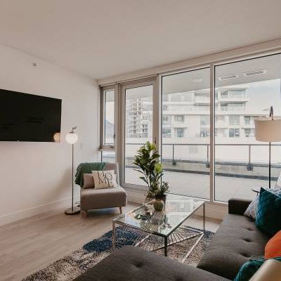 Modern & Stylish Furnished 2 Bedroom + Den @ Ellis Parc - Photo 3