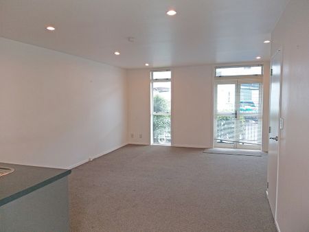 Townhouse Living in fully gated complex with 2 carparks - Photo 3