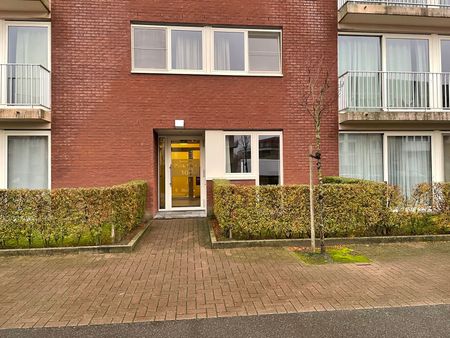 Gelijkvloers appartement met 1 slaapkamer, terras en tuintje - Photo 3