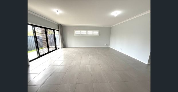 Brand New 4-Bedroom Home for Rent - Photo 1