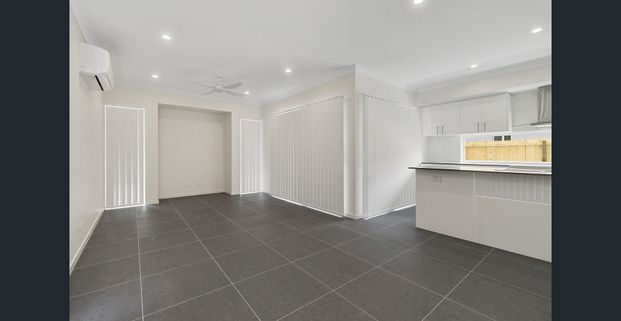 Modern Coastal Living in the Heart of Beachmere! - Photo 1