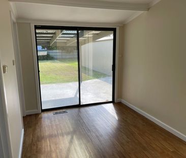 COMFORTABLE 3 BEDROOM HOME - Photo 1