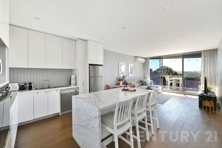 Elevated Luxury with Soaring Ceilings & Water Views - Photo 3