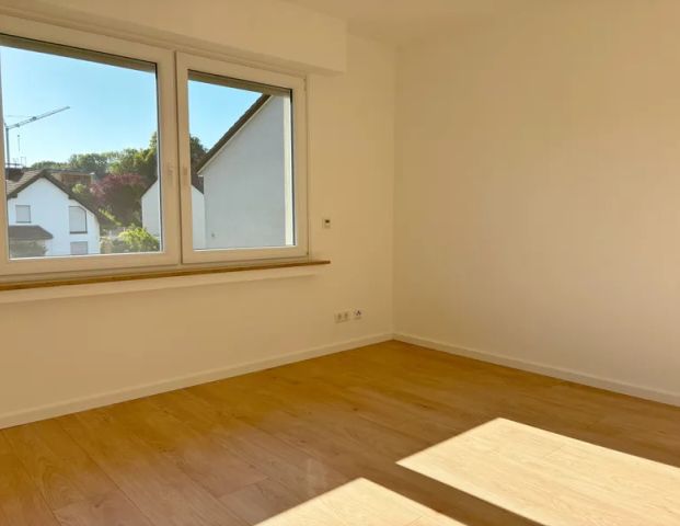 WIE NEU: 4-Zimmer-Wohnung mit Balkon in Paffrath in Gartenlage - Photo 1