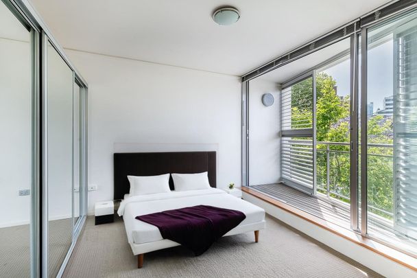 Sunny & Spacious North facing gem – Parking & Balcony - Photo 1