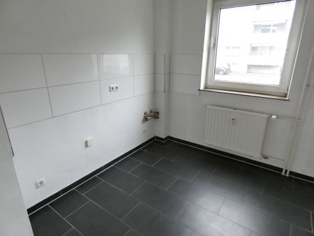 Schicke Erdgeschoss-Wohnung mit Balkon in ruhiger Lage - Photo 3