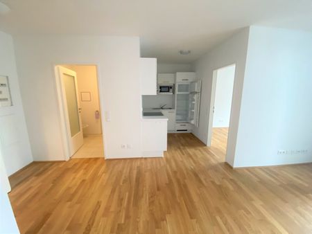 Ideale 2-Zimmer-Dachgeschosswohnung mit Grünblick in Stammersdorfer Heurigengegend - Photo 5