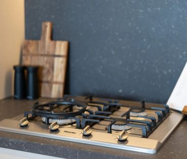 Near New Luxuriously Appointed Two Bedroom in Designer 'NEUE' Complex - Photo 5