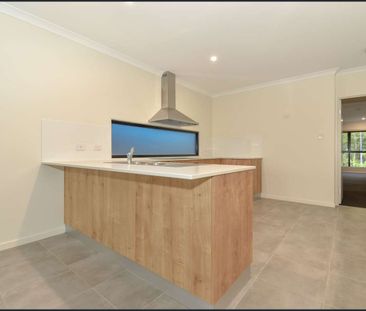 Modern Three-Bedroom Townhouse in a Sought-After Coastal Location- ... - Photo 3