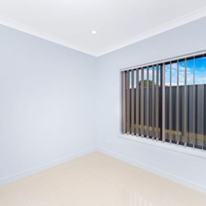 Charming 2-Bedroom Home in Great Location in Macquarie Fields!!! - Photo 1