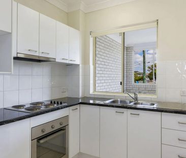 LOW MAINTENANCE WITH STUDY & COURTYARD - Photo 1