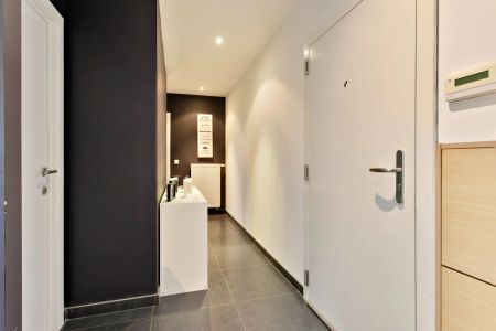 Recent lichtrijk 2slpk-appartement met terras, garagebox en kelder - Photo 5