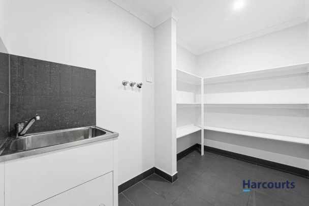 “Modern Family Residence Offering Comforts and Low-Maintenance Living” - Photo 1