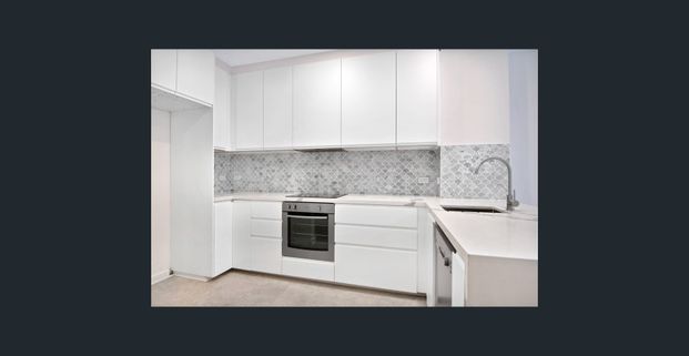 Stylish and Spacious Apartment with Tranquil Outlook - Photo 1