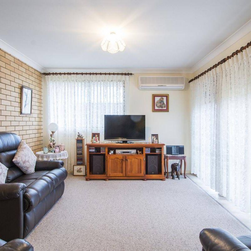 CHARMING UNIT CLOSE TO EVERYTHING - Photo 1