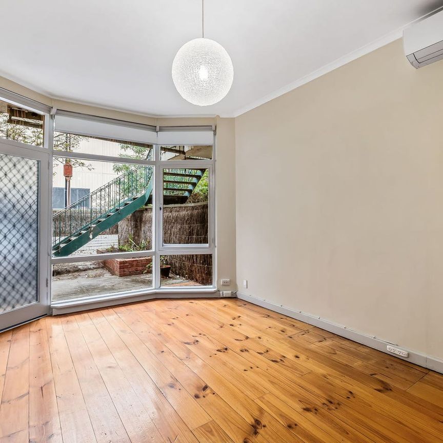 Warm and Vibrant Low Maintenance Living in a Prime Location - Photo 1