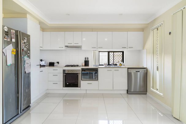 MODERN 2-BEDROOM UNIT IN A SOUGHT AFTER SUBURB - Photo 1