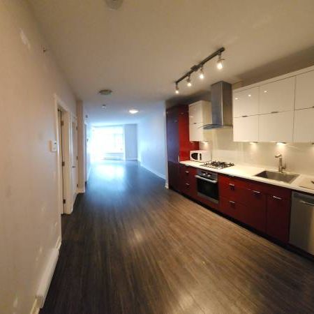 Sought-after One Bedroom + Den at Kits - Photo 1