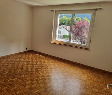 Appartement de 3 pièces au 1er étage avec part au grand jardin commun - Photo 2