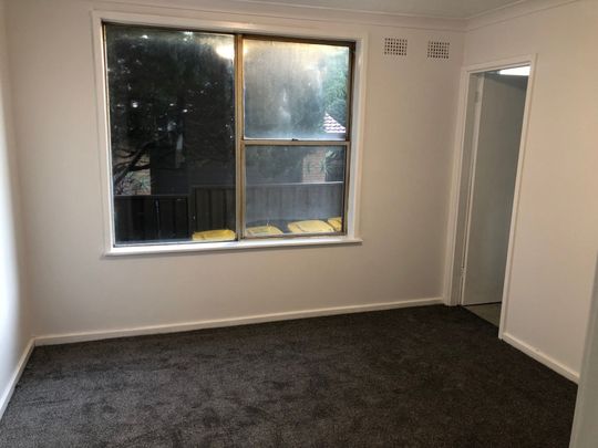 One bedroom unit with single carport - Photo 1
