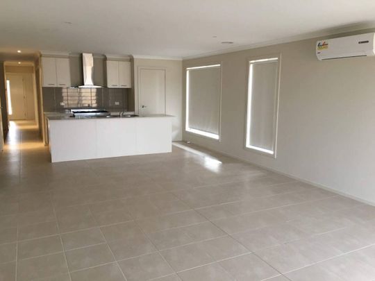 MODERN SPACIOUS FOUR BEDROOM HOME - Photo 1